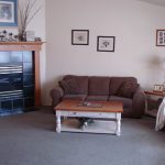 leather couch and coffee table inside boise group home